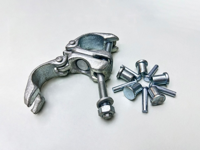 swivel coupler cap rivet